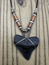Load image into Gallery viewer, 2 inch Fossilized Megalodon Shark Tooth Necklace featuring Brown Bones with White Rings
