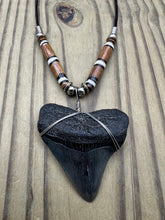 Load image into Gallery viewer, 2 inch Fossilized Megalodon Shark Tooth Necklace featuring Brown Bones with White Rings

