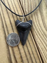 Load image into Gallery viewer, 1 15/16-Inch Fossilized Megalodon Shark Tooth Necklace – Dark Enamel Blade
