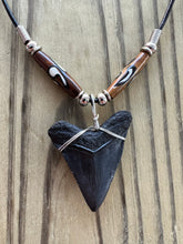 Load image into Gallery viewer, Sleek Black Megalodon Shark Tooth Necklace with Brown Bone Beads 1 11/16 Inch

