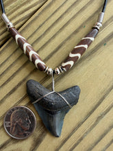 Load image into Gallery viewer, 1 13/16 Inch Megalodon Shark Tooth Necklace | Charcoal Gray | Wave Stripe Bone Beads
